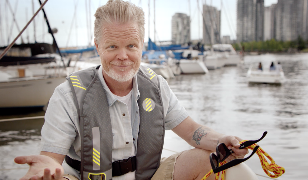 Man on a boat wearing a lifejacket